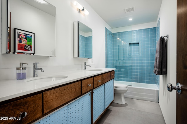 7646 E Catalina Dr, Scottsdale, AZ 85251 - full bathroom with double vanity, a sink, visible vents, and toilet