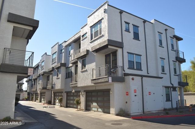 view of building exterior with an attached garage