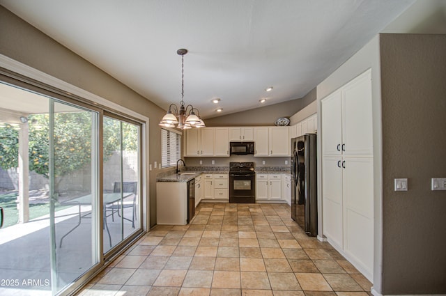 kitchen with light stone counters, an inviting chandelier, a sink, black appliances, and white cabinets