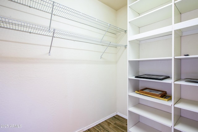 42531 W Heavenly Pl, Maricopa, AZ 85138 - spacious closet with wood finished floors