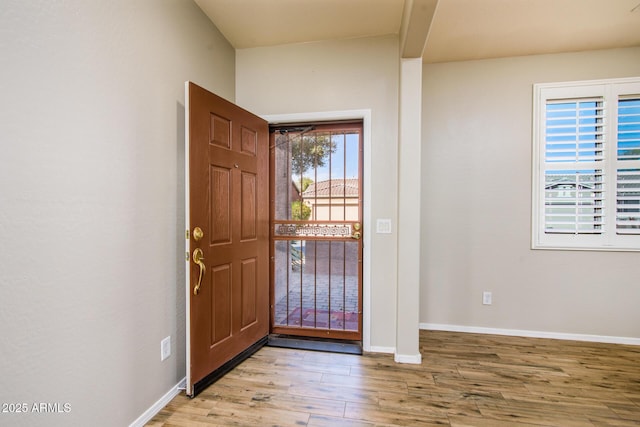 42531 W Heavenly Pl, Maricopa, AZ 85138 - foyer entrance with light wood-type flooring and baseboards