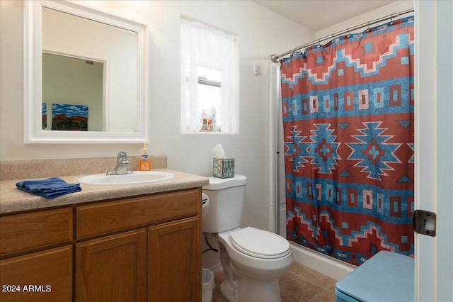 bathroom featuring vanity, toilet, curtained shower, and tile patterned floors