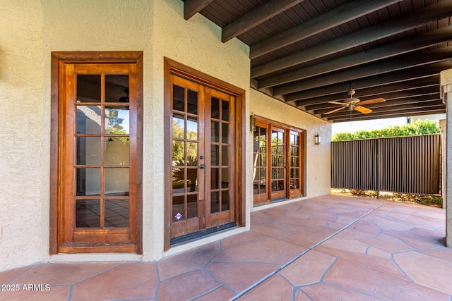 view of patio / terrace featuring french doors and ceiling fan