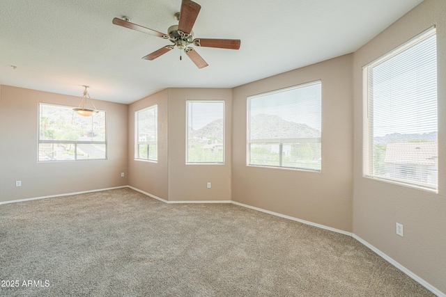 9820 N Central Ave Unit 212, Phoenix, AZ 85020 - carpeted spare room with a ceiling fan and baseboards