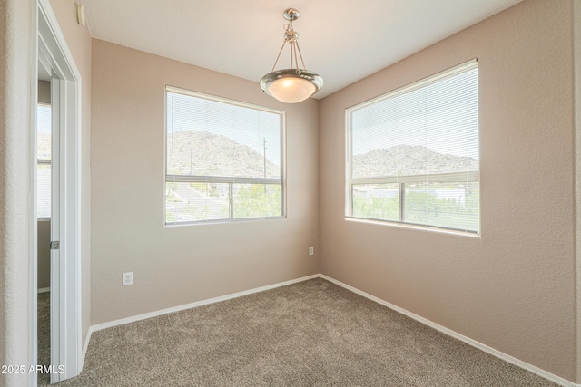 9820 N Central Ave Unit 212, Phoenix, AZ 85020 - carpeted empty room featuring baseboards