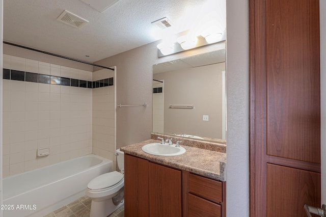 9820 N Central Ave Unit 212, Phoenix, AZ 85020 - full bathroom featuring vanity, shower / tub combination, a textured ceiling, and a textured wall