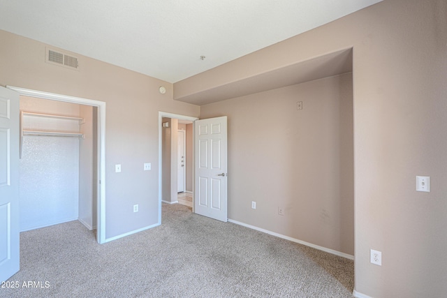 9820 N Central Ave Unit 212, Phoenix, AZ 85020 - unfurnished bedroom featuring carpet floors and a closet
