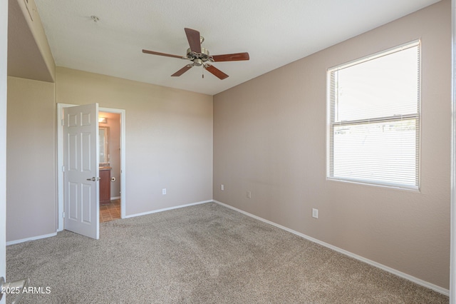 9820 N Central Ave Unit 212, Phoenix, AZ 85020 - empty room with light colored carpet, plenty of natural light, and a ceiling fan