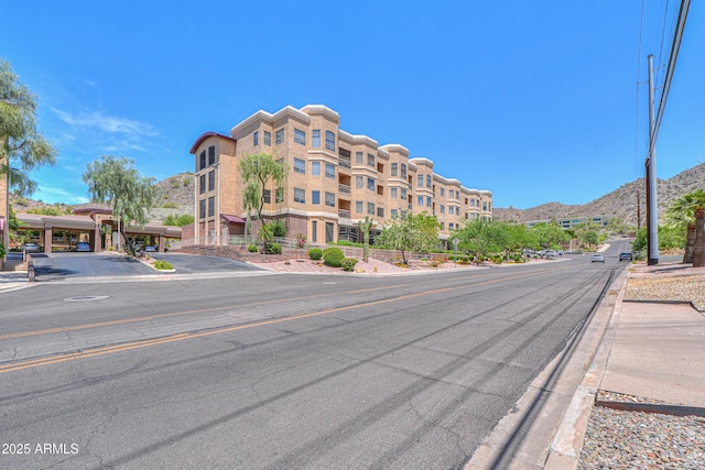 9820 N Central Ave Unit 212, Phoenix, AZ 85020 - view of building exterior with a mountain view