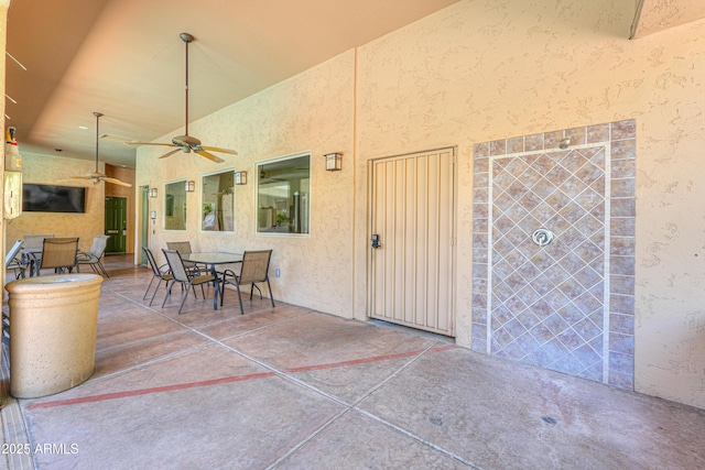 9820 N Central Ave Unit 212, Phoenix, AZ 85020 - view of patio / terrace featuring outdoor dining space and a ceiling fan