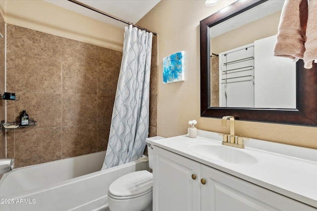 bathroom with vanity, shower / tub combo with curtain, and toilet