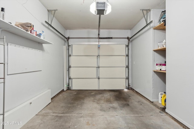garage featuring a garage door opener