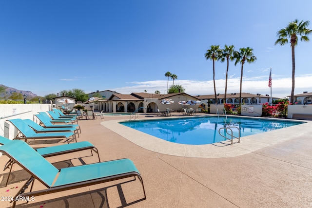 view of pool featuring a patio area