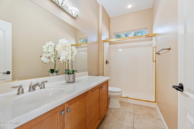 12820 W La Vina Dr, Sun City West, AZ 85375 - bathroom with baseboards, a shower stall, toilet, and vanity