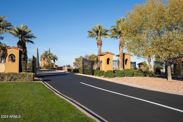 12820 W La Vina Dr, Sun City West, AZ 85375 - view of road featuring a gate, a gated entry, and curbs