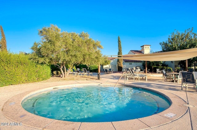 12820 W La Vina Dr, Sun City West, AZ 85375 - view of pool featuring a pool and a patio area