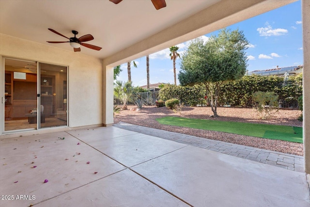 12820 W La Vina Dr, Sun City West, AZ 85375 - view of patio / terrace with a fenced backyard and a ceiling fan
