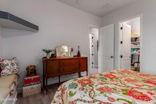 bedroom featuring hardwood / wood-style flooring