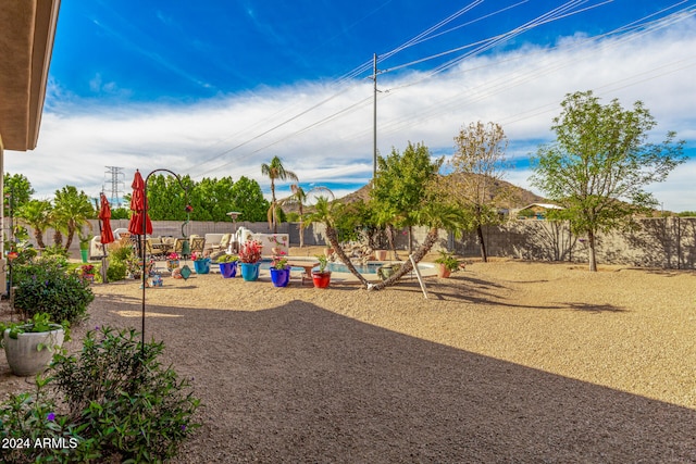 view of jungle gym with a pool