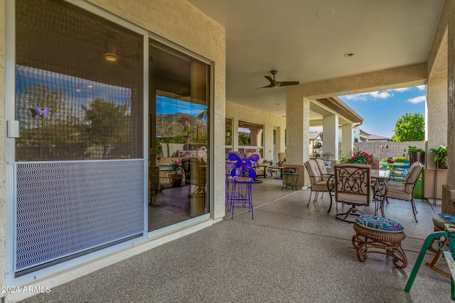 view of patio / terrace with ceiling fan