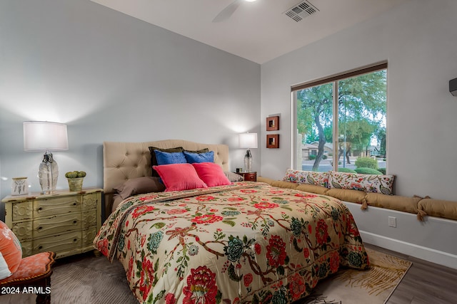 bedroom featuring hardwood / wood-style floors and ceiling fan