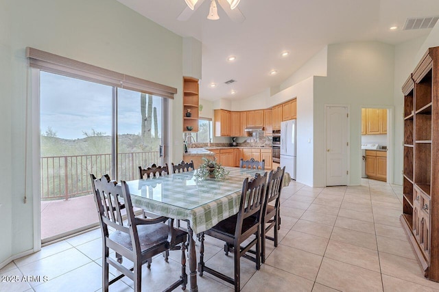 16507 E Trevino Dr, Fountain Hills, AZ 85268 - dining room featuring visible vents, high vaulted ceiling, light tile patterned floors, and a ceiling fan