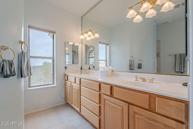 16507 E Trevino Dr, Fountain Hills, AZ 85268 - full bathroom with double vanity, a sink, baseboards, and visible vents