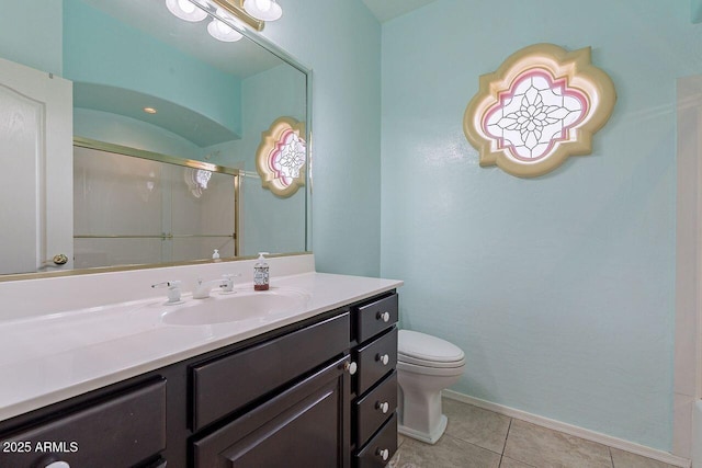 16507 E Trevino Dr, Fountain Hills, AZ 85268 - bathroom with vanity, toilet, baseboards, tile patterned floors, and an enclosed shower