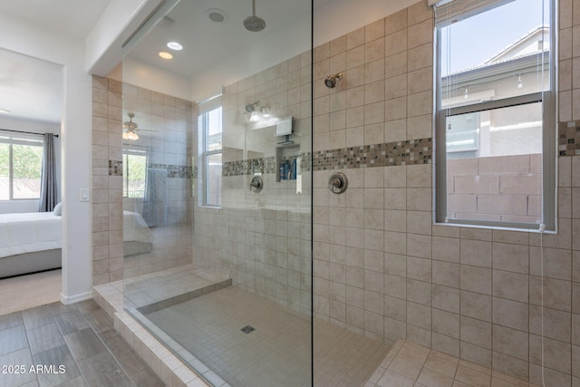 ensuite bathroom featuring recessed lighting, tile patterned flooring, walk in shower, and ensuite bath