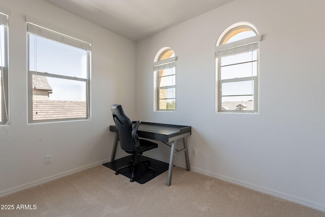 carpeted office with baseboards