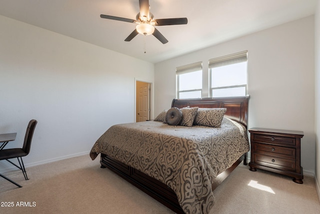 bedroom with carpet floors, baseboards, and ceiling fan