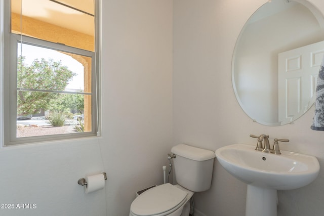 bathroom with a sink and toilet