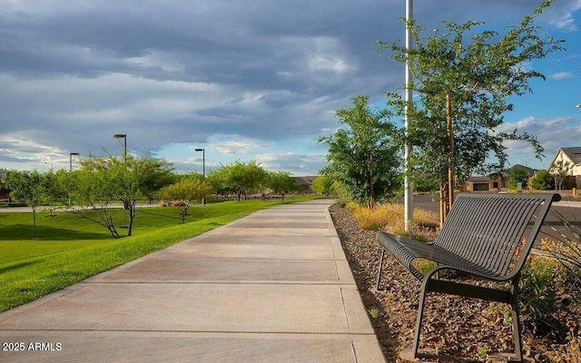surrounding community featuring a lawn