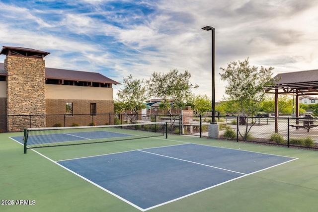 view of sport court with fence and community basketball court