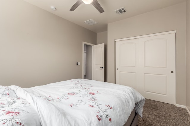 bedroom with ceiling fan, a closet, and carpet floors