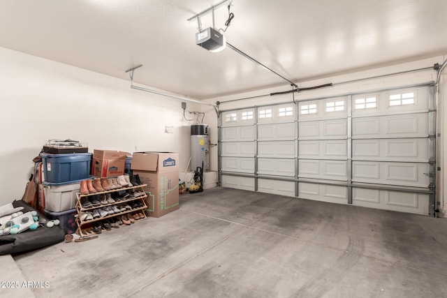 garage with water heater and a garage door opener