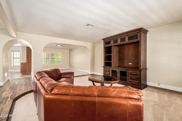 119 E Palomino Dr, Tempe, AZ 85284 - living room with arched walkways and wood finished floors