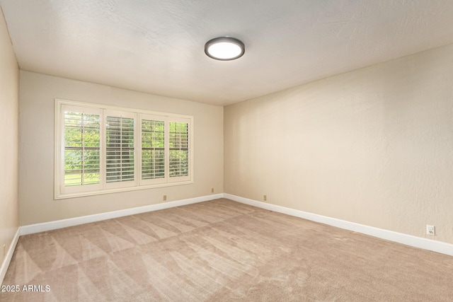 119 E Palomino Dr, Tempe, AZ 85284 - empty room with light carpet and baseboards
