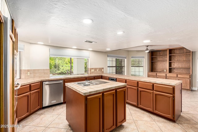 119 E Palomino Dr, Tempe, AZ 85284 - kitchen with dishwasher, a textured ceiling, a peninsula, tile counters, and recessed lighting