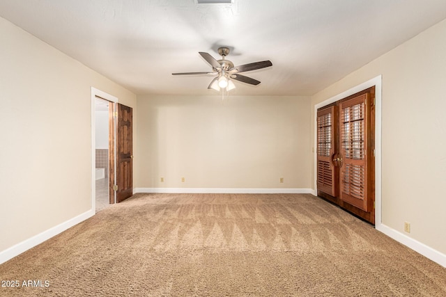 119 E Palomino Dr, Tempe, AZ 85284 - unfurnished room featuring light colored carpet, ceiling fan, and french doors