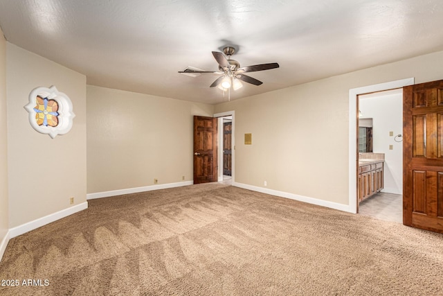 119 E Palomino Dr, Tempe, AZ 85284 - unfurnished bedroom featuring light carpet, ensuite bathroom, and ceiling fan
