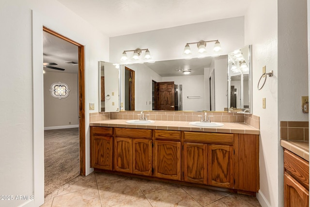 119 E Palomino Dr, Tempe, AZ 85284 - bathroom with double vanity, backsplash, and tile patterned flooring
