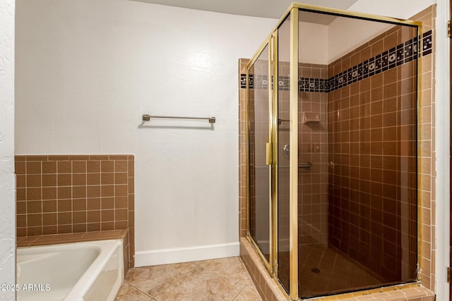119 E Palomino Dr, Tempe, AZ 85284 - bathroom featuring a shower stall, a bath, and tile patterned floors