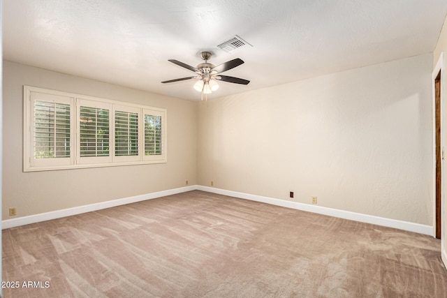 119 E Palomino Dr, Tempe, AZ 85284 - spare room featuring light colored carpet and a ceiling fan