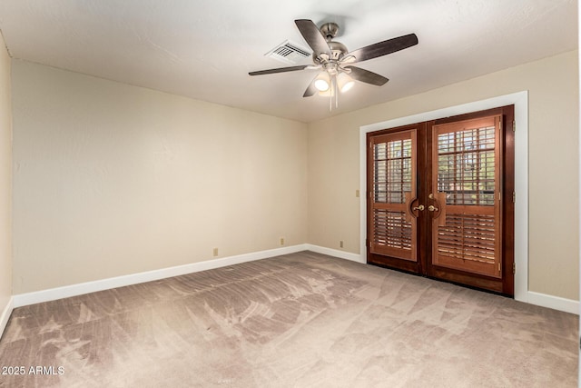 119 E Palomino Dr, Tempe, AZ 85284 - empty room with light carpet, french doors, and a ceiling fan