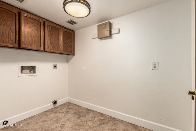 119 E Palomino Dr, Tempe, AZ 85284 - laundry room featuring washer hookup, cabinet space, light tile patterned floors, and hookup for an electric dryer