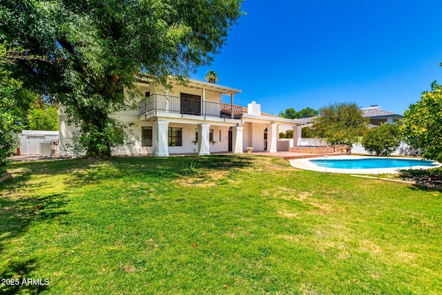 119 E Palomino Dr, Tempe, AZ 85284 - back of house with a balcony, a patio area, and a chimney