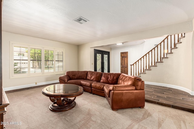 119 E Palomino Dr, Tempe, AZ 85284 - carpeted living area with baseboards and stairway