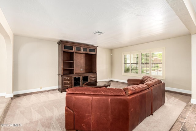 119 E Palomino Dr, Tempe, AZ 85284 - living room featuring baseboards and light carpet