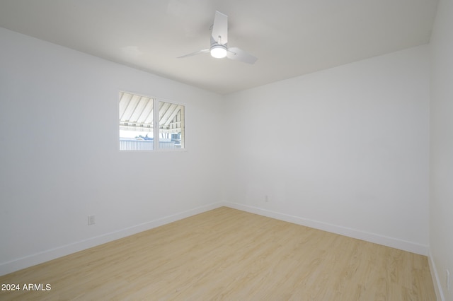 unfurnished room with light hardwood / wood-style floors and ceiling fan